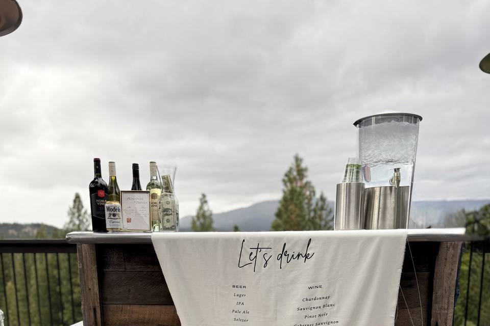 Outdoor bar with custom weddin