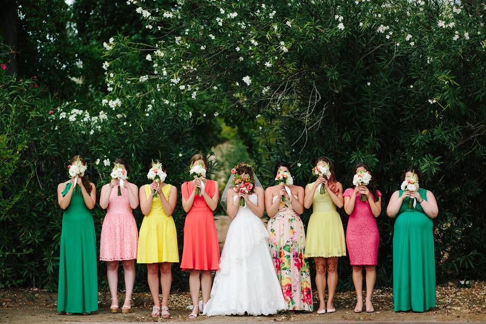 Bride and her colorful bridesmaids