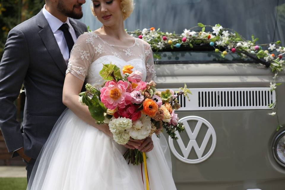 Bride and her colorful bridesmaids