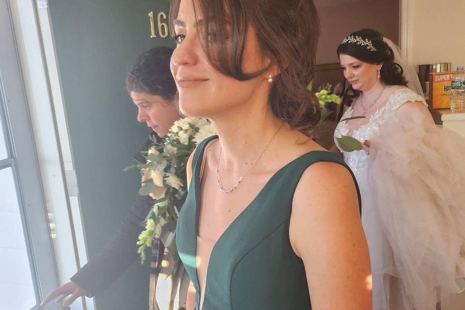 Bridesmaid low tousled updo