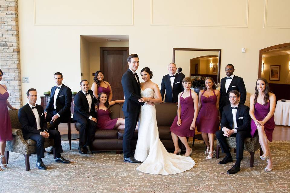 Newlyweds, bridesmaids, and groomsmen