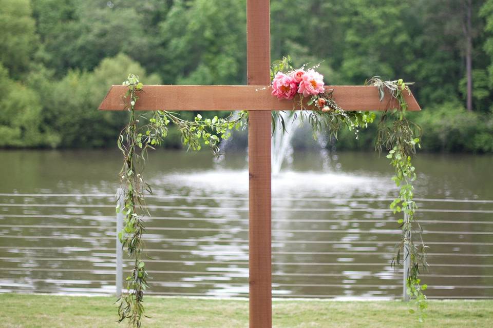 Cross used as altar backdrop at this beautiful wedding