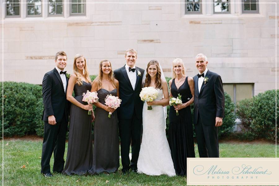 The couple with the bridesmaids and groomsmen