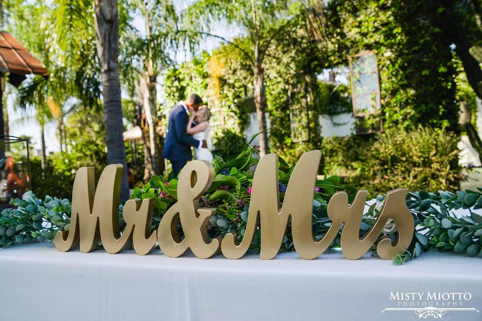 Newlyweds by the sign