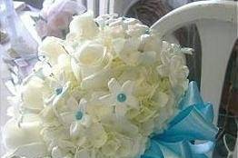 White hydrangea, roses, & gem accented stephanotis