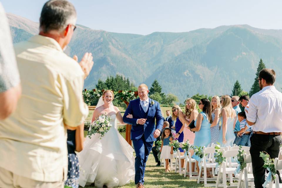 Bride and groom walking out