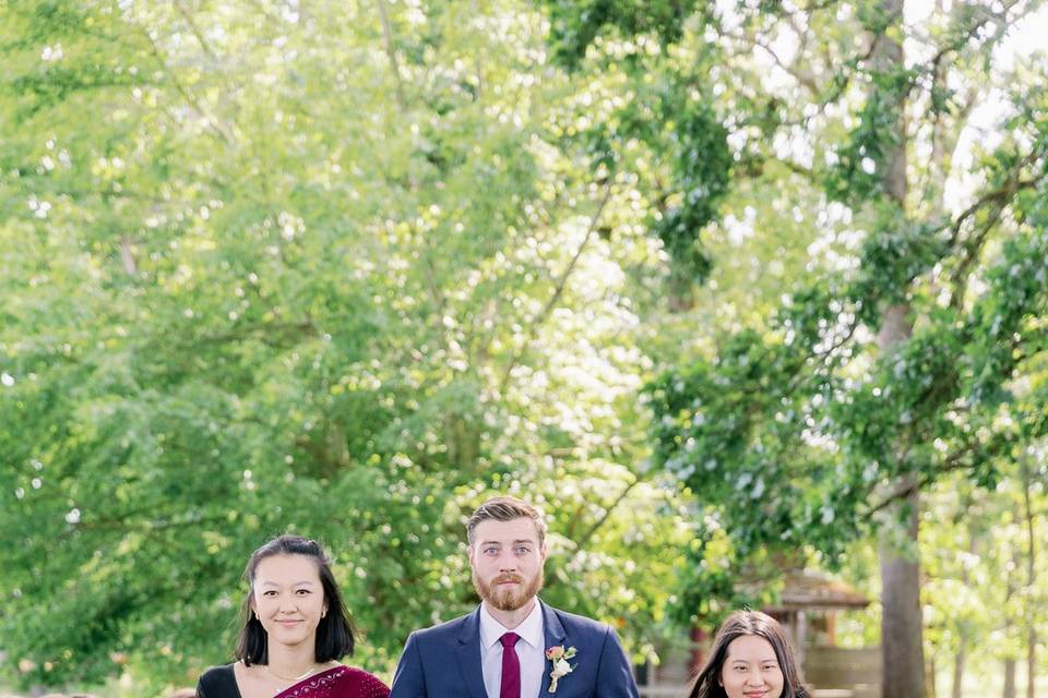 Groom and bridesmaid walking