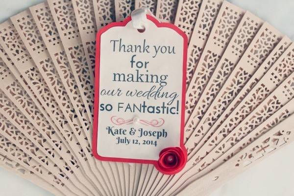 These wedding fans with gift tags are perfect for weddings less ordinary. There is nothing worse than giving meaningless presents at your wedding. Your gift always needs to be part of your love story or your nature as a couple. So, if you want fun, practical and effective wedding favor - you are at the right place.Included in your gift tag set are: • Double layered, die cut gift tags• Made with premium 160gsm card • Hand folded flower in colors of your choice• Mix and match 5 exclusive designs• Sets of gift tags only or fans with gift tags available • A choice between sandal wood or silk fans These gift tags can be tailored to suit any color scheme. Contact us now and request your custom order.