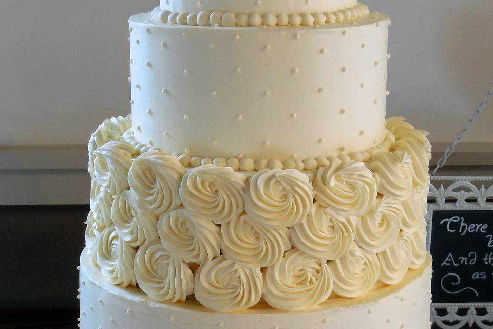 Christine S. Buttercream Rosettes and Dotted Swiss