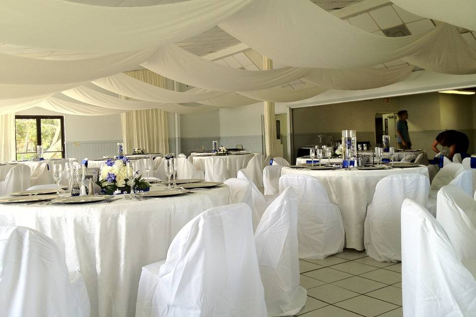 Elegant white reception hall setup