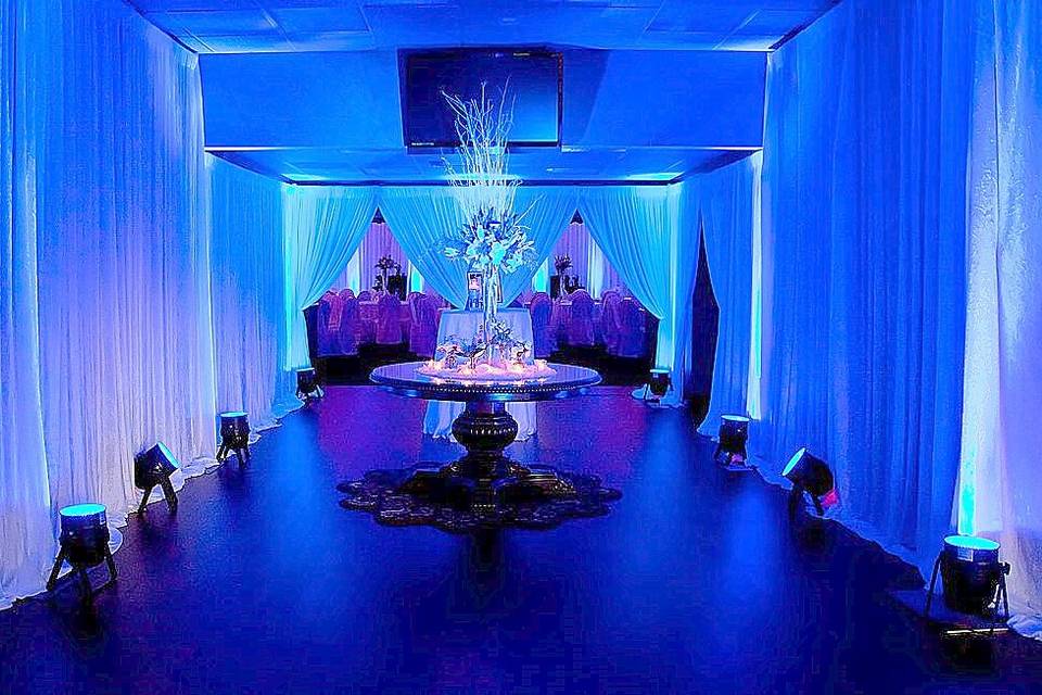 Blue lighting throughout the reception hall