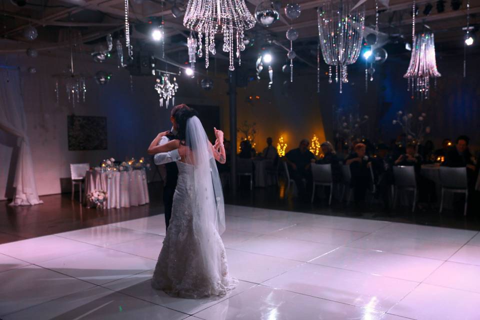 White dance floor and chandeliers