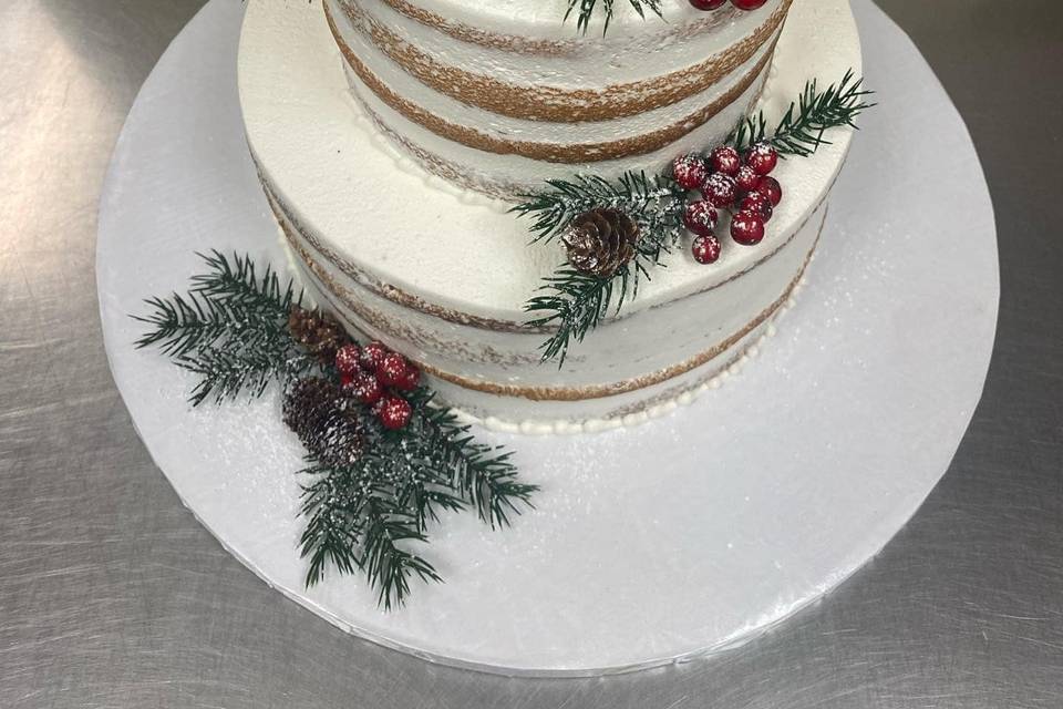 Holly and pine naked tier cake