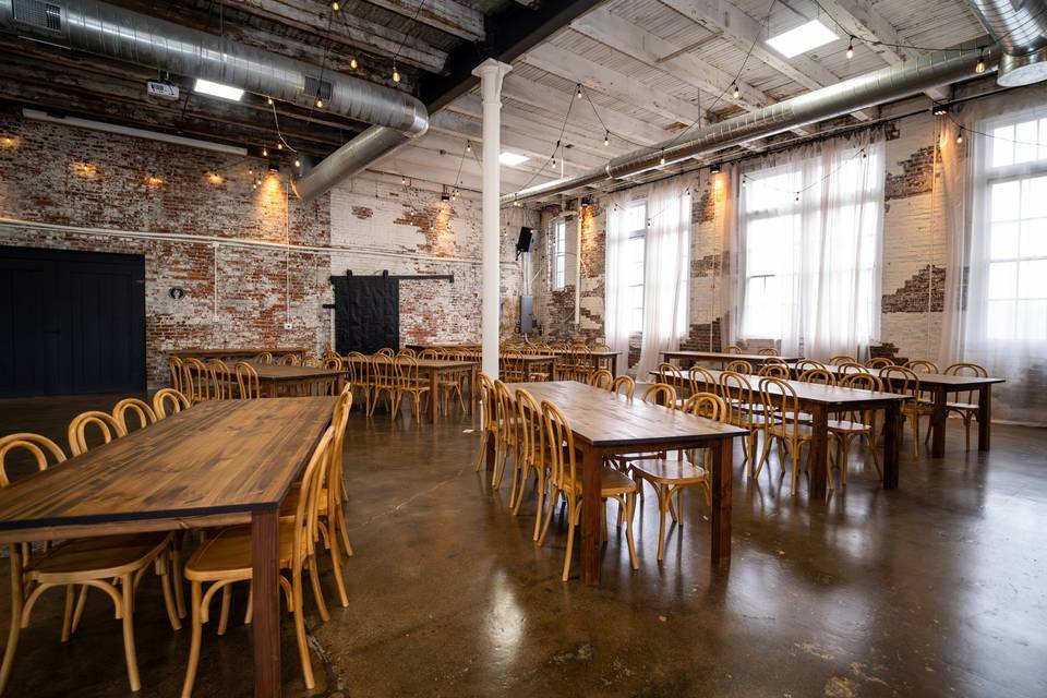 Reception hall with wooden tables