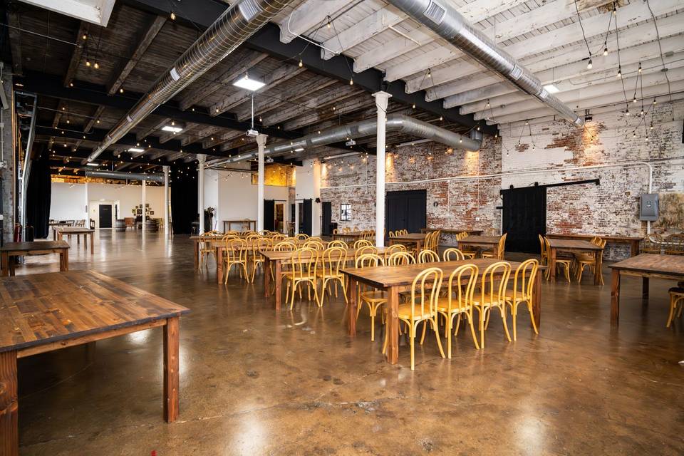 Rustic tables under wood beams