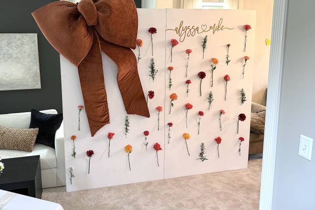Flower wall with big bow