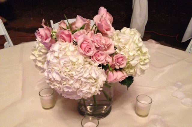 Hydrangeas help fill a centerpiece at a low cost!