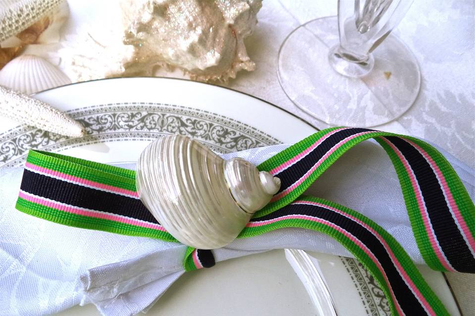 Shell Napkin Ring . So many ways to tie this! Pearlized shell with our preppy blue, pink and green ribbon. Very Nautical, very very pretty.  Much more delicate and formal than our chunky version