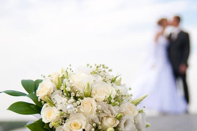 Wedding flowers with couple