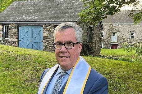 Cogan outside church