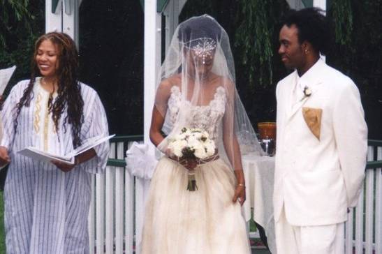 The couple with the officiant