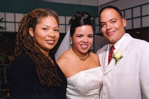 The couple with the officiant