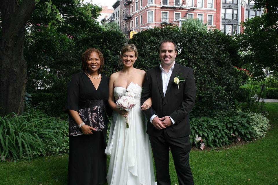 The couple with the officiant