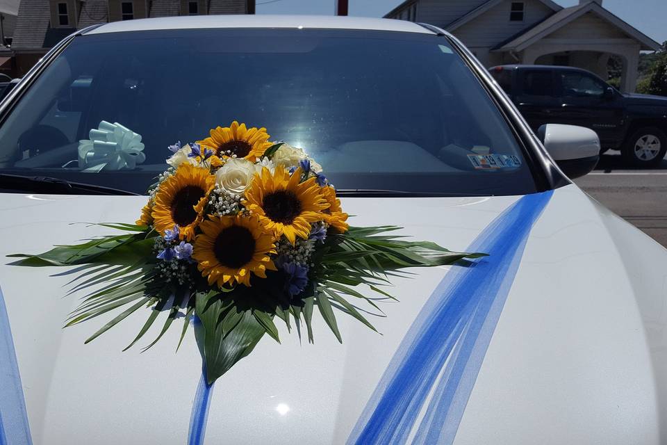 Sunflowers on the wedding car