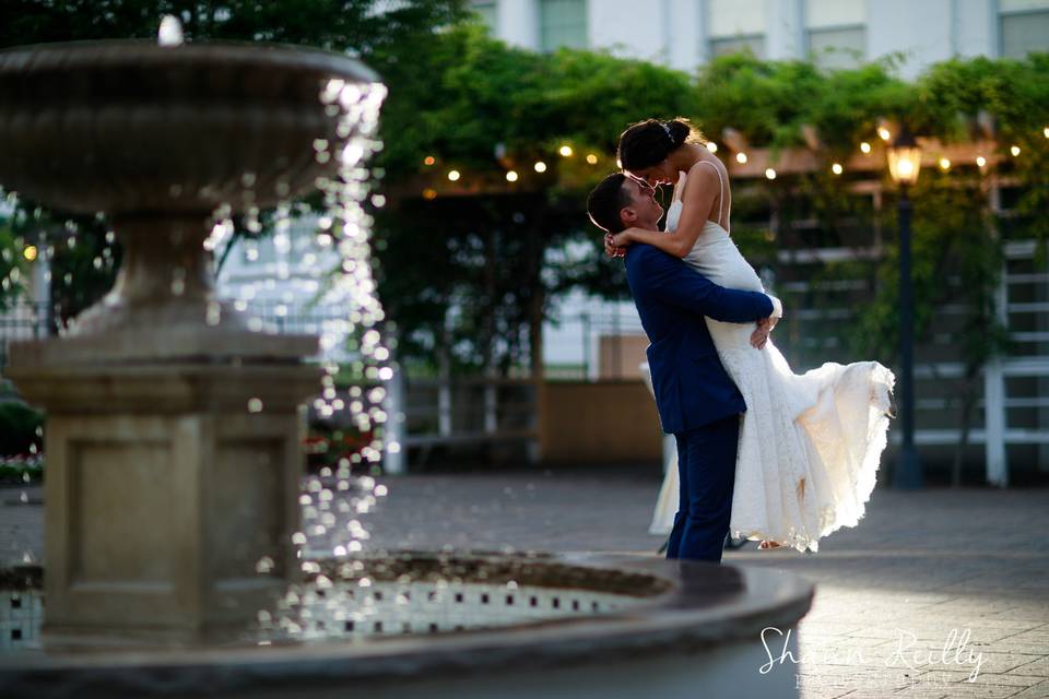 A couple by the fountain