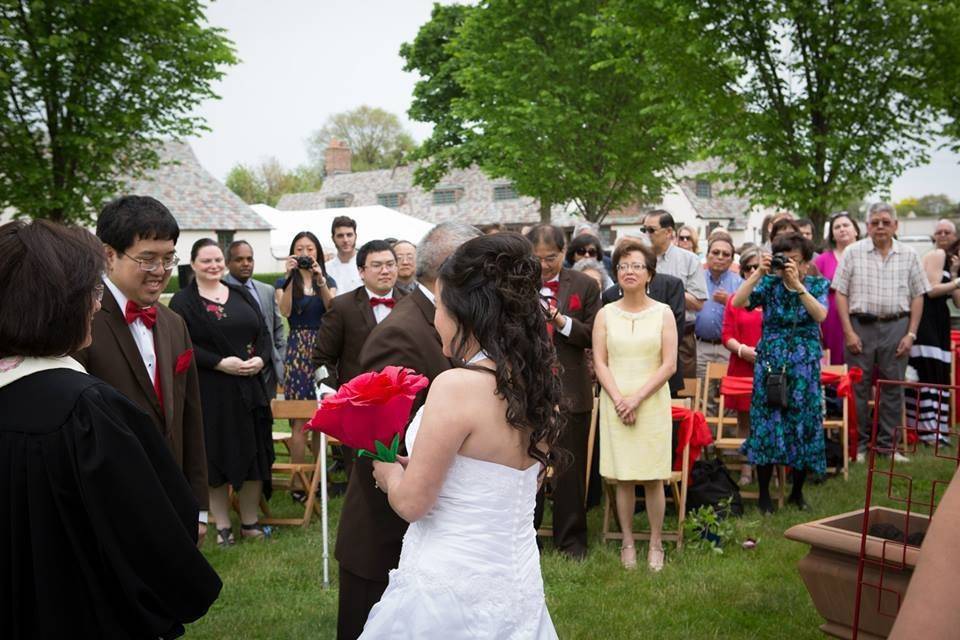 The couple with the bridesmaids and groomsmen