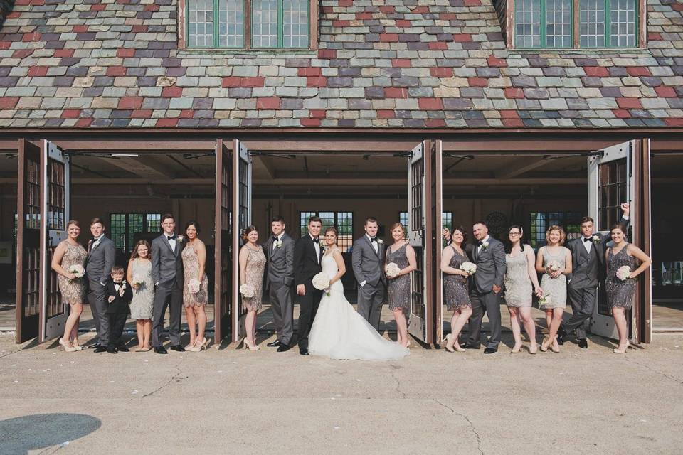 The couple with the bridesmaids and groomsmen