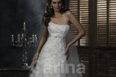 A-line/Princess Lace/Satin Ivory Wedding Dresses
Show Color 	Ivory
Fabric 	Lace
Neckline 	Strapless
Built-in Bra 	Yes
Sleeve 	Sleeveless
Embellishment 	Applique
Silhouette 	A-line
Train/Hemline 	Chapel
Back Detail 	Lace Up
Body Shape 	Hour Glass, Pear, Apple, Petite