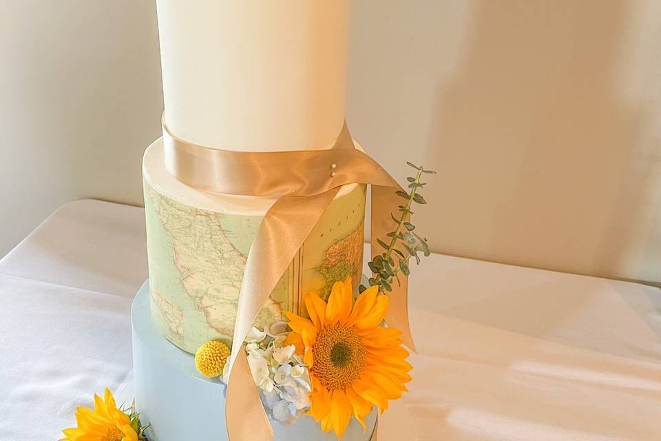 Travel themed wedding cake