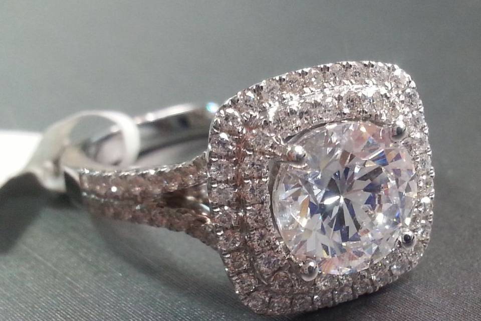 A glamorous double halo engagement ring from designer, Natalie K.
18K White Gold