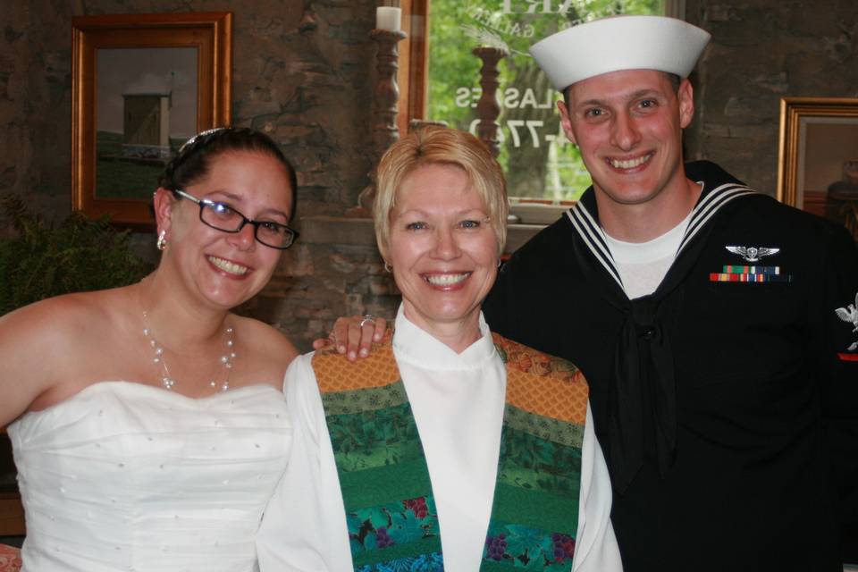 Newlyweds and the officiant