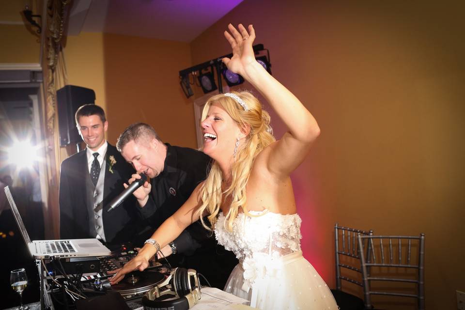 Bride and the wedding dj