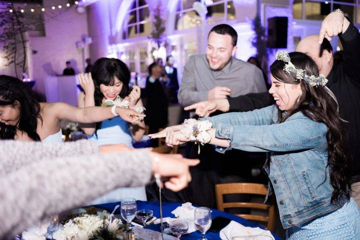 Wedding party having fun during the wedding reception