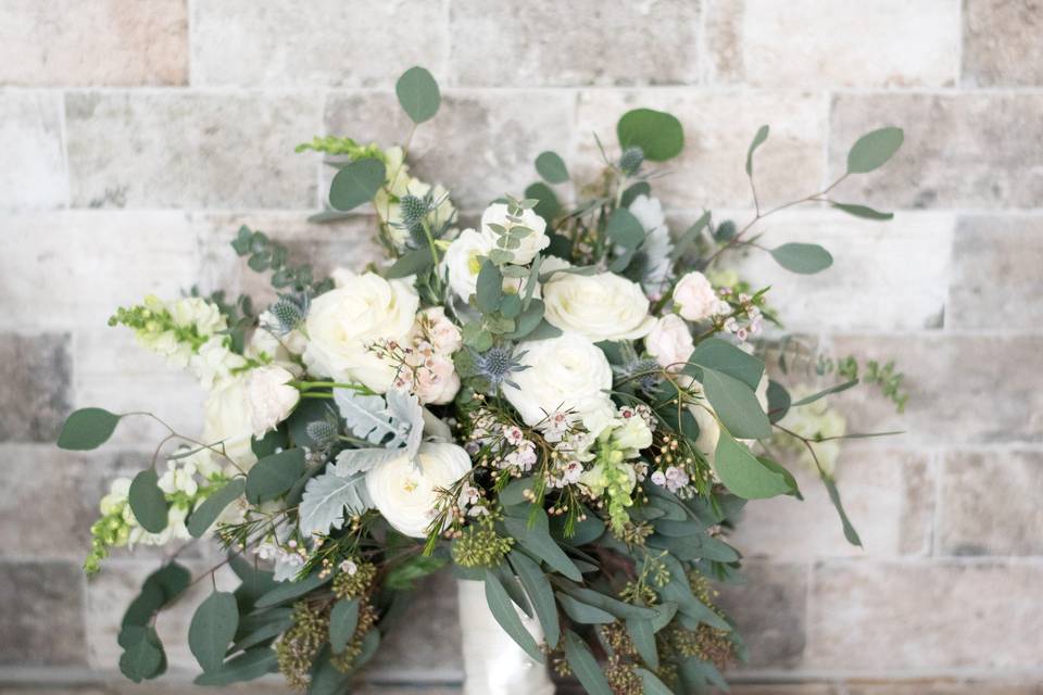 White with greenery accents