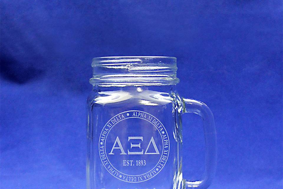 This custom jar glass makes a perfect wedding gift or keepsake.  Each is permanently sand-etched with the Bride & Groom's name, nickname, monogram, date...whatever you would like to make a one-of-a-kind gift for Attendees, the Bridal Party or the Wedding Couple!