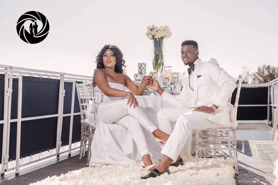 Couple posing by the table