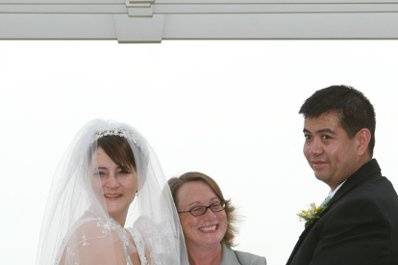 Couple with the officiant