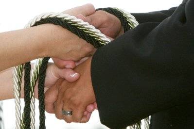 Couple with the officiant