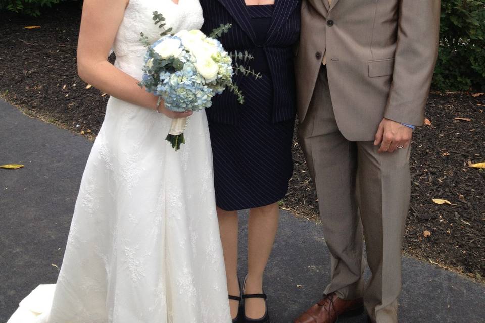 Couple with the officiant