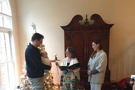 Christmas christening ceremony for a precious angel.