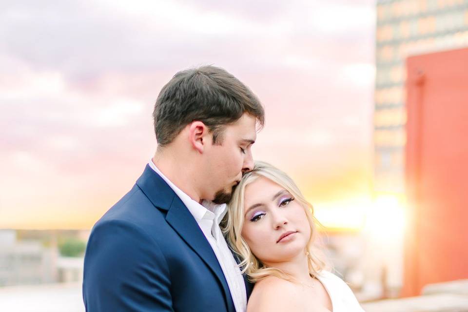 Sunset rooftop engagement
