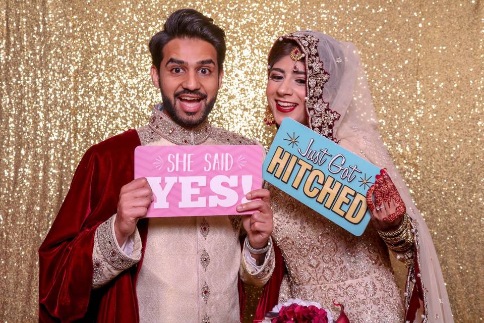 Newlyweds in photo booth