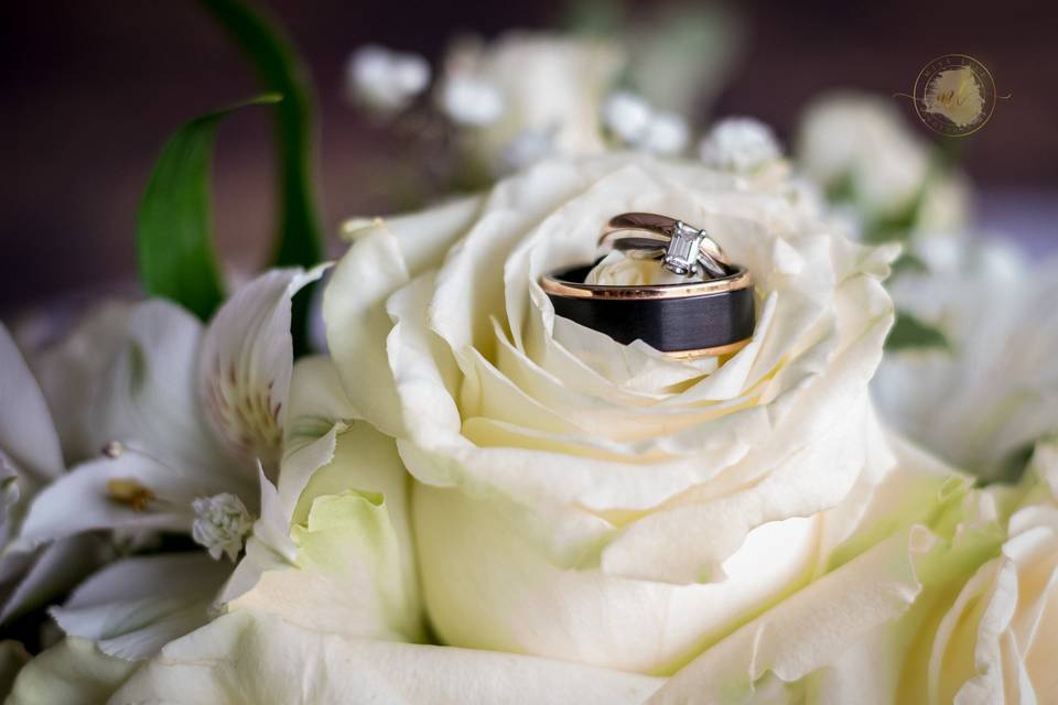 With this ring.