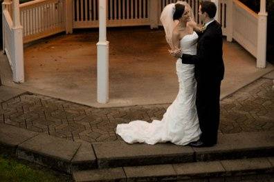 Newlyweds by the gazebo