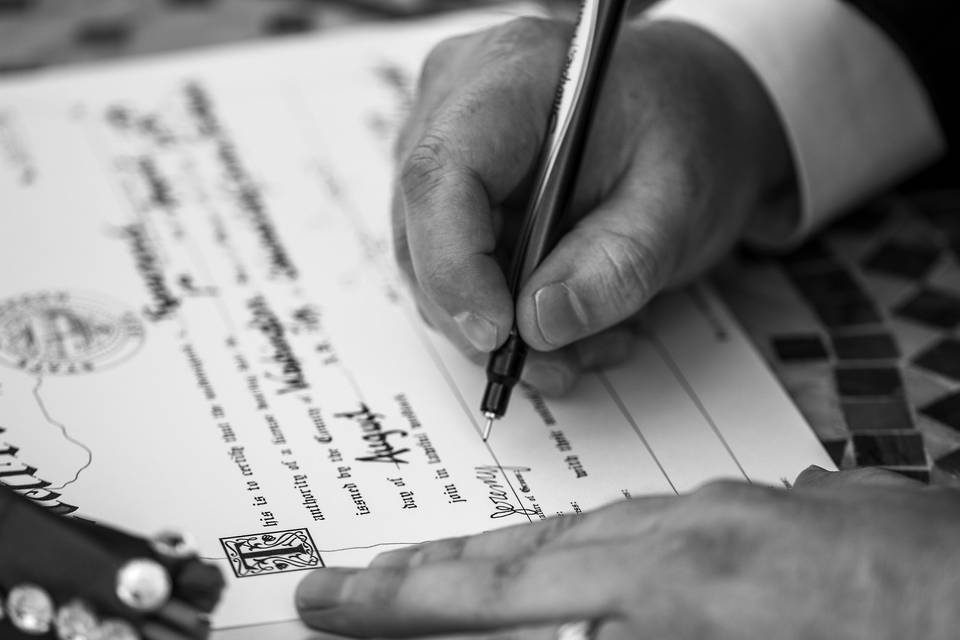 Signing the papers