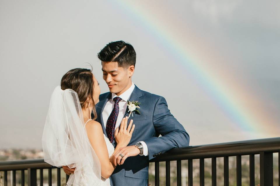 Hawaiian rainbow bride groom